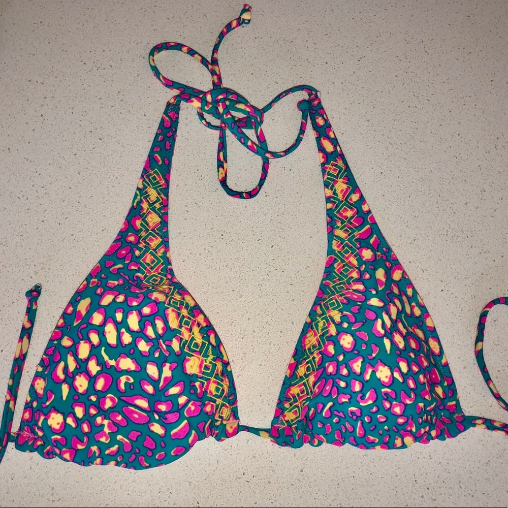 Reversible swim top